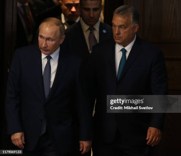 Russian President Vladimir Putin and Hungarian Prime Minister Viktor Orban attend their joint press conference on October 30, 2019 in Budapest,...