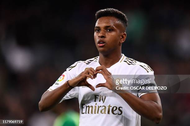Real Madrid's Brazilian forward Rodrygo celebrates after scoring a goal during the Spanish league football match between Real Madrid CF and Club...