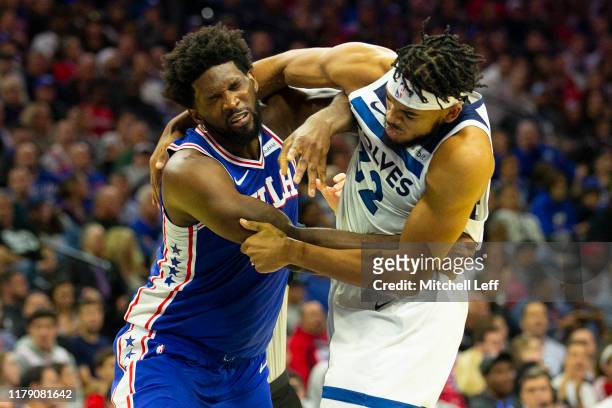 Joel Embiid of the Philadelphia 76ers gets in a fight with Karl-Anthony Towns of the Minnesota Timberwolves in the third quarter at the Wells Fargo...
