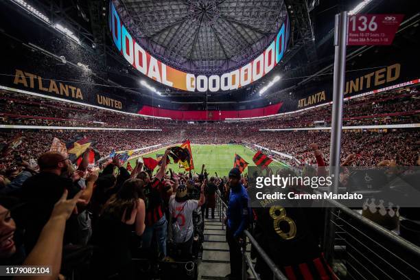 Fans celebrate a goal scored by Julian Gressel of Atlanta United during the first half of the Eastern Conference Finals between Atlanta United and...