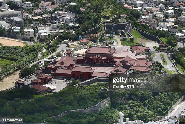 This aerial picture taken on June 27, 2014 shows the historic Shuri Castle in Naha, Okinawa prefecture, southern Japan. - A fire ripped through the...