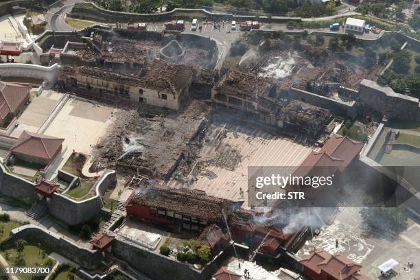 This aerial picture shows Shuri Castle after a fire ripped through the historic site in Naha, Japan's southern Okinawa prefecture on October 31,...