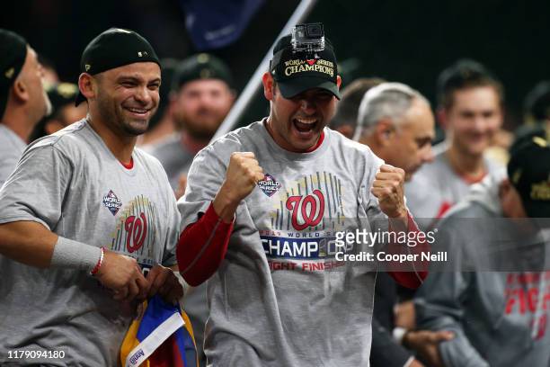 Gerardo Parra and Anibal Sanchez of the Washington Nationals celebrate alongside teammates after the Nationals defeated the Houston Astros in Game 7...
