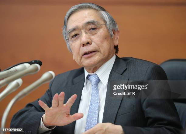 Governor of the Bank of Japan , Haruhiko Kuroda speaks during his regular press conference at the BoJ headquarters in Tokyo on October 31, 2019. -...