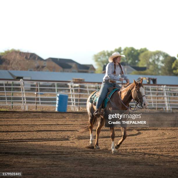 cowgirl reiten - girl wearing boots stock-fotos und bilder