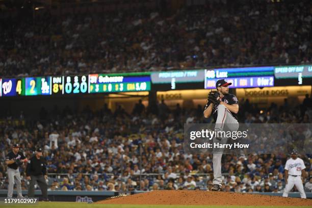 Max Scherzer of the Washington Nationals pitches in relief in the eighth inning in game two of the National League Division Series against the Los...