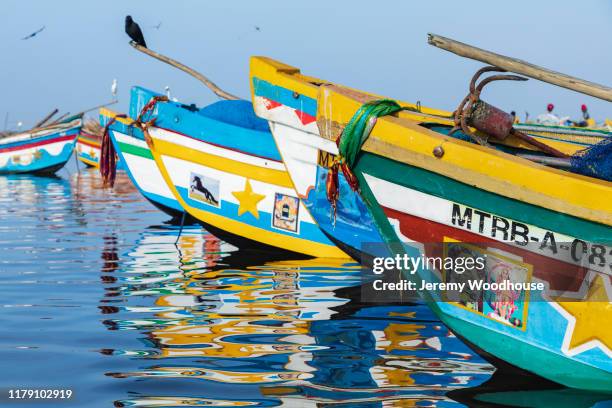 colorful fishing boats at crow island fish market - jaffna stock pictures, royalty-free photos & images