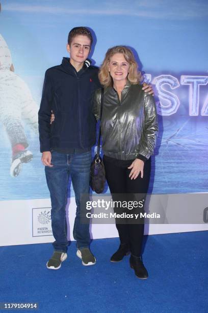 Nicolas Buenfil and Erika Buenfil pose for photos at the red carpet before the Cirque Du Soleil show 'CRYSTAL' at Palacio de Los Deportes on October...