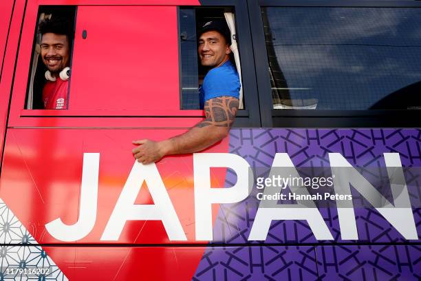 Ardie Savea and Codie Taylor of the All Blacks leave on the team bus following the New Zealand Captain's Run at the Arcs Urayasu Park on October 05,...