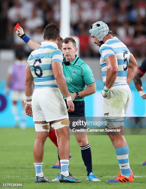 Tomas Lavanini of Argentina leaves the pitch after shown a red card by referee Nigel Owens during the Rugby World Cup 2019 Group C game between...