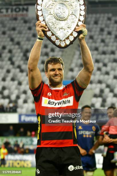 Captain Luke Whitelock of Canterbury celebrates winning the Ranfurly Shield during the round 9 Mitre 10 Cup match between Otago and Canterbury at...