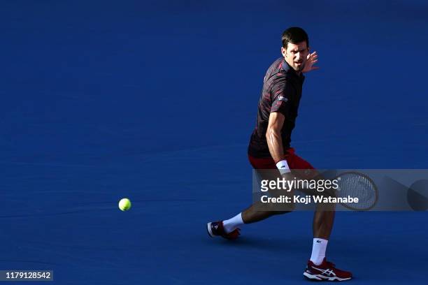 Novak Djokovic of Serbia return shot during his match against David Goffin of Belgium on day six of the Rakuten Open at the Ariake Coliseum on...