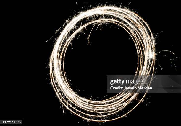 small sparkler circle - noughts stock pictures, royalty-free photos & images