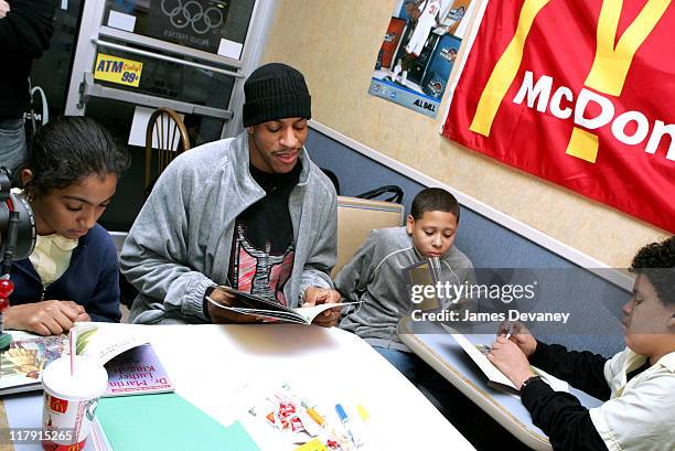 Jerome Williams of the New York Knicks with children