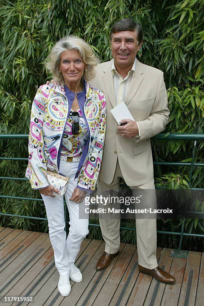 Jean-Pierre Foucault and his wife arrive in the 'Village', the VIP area of the French Open at Roland Garros arena in Paris, France on June 7, 2007.