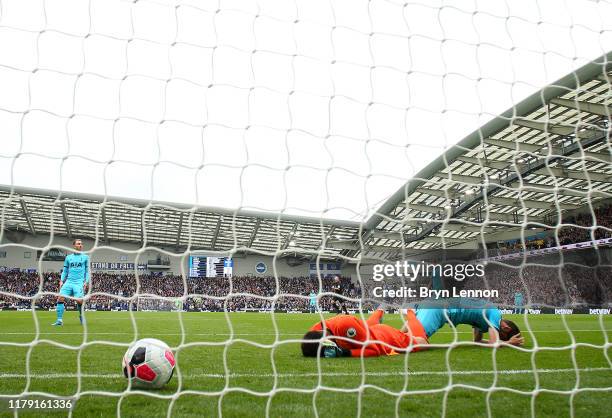 Paulo Gazzaniga and Jan Vertonghen of Tottenham Hotspur looks dejected after conceding during the Premier League match between Brighton & Hove Albion...