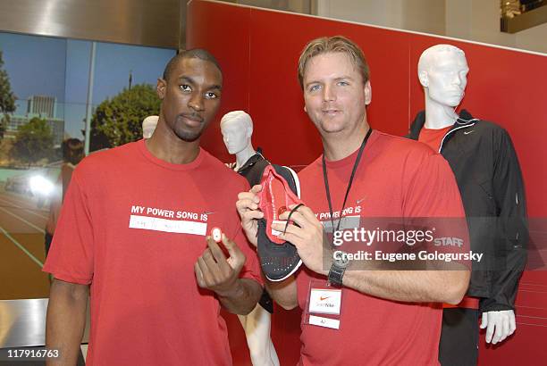 Ben Gordon, AJ Pierzinski during Star Athletes Converge on Niketown for Retail Debut of Nike + iPod Sports Kit - July 13, 2006 at Niketown in New...