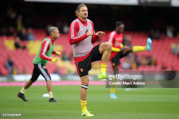 Sebastian Prodl of Watford warms up ahead of the Premier League match between Watford FC and Sheffield United at Vicarage Road on October 05, 2019 in...