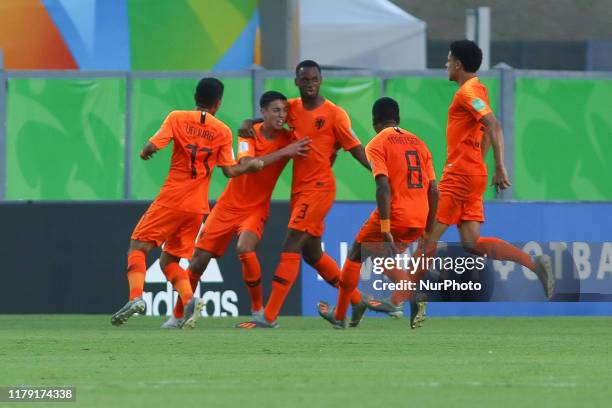 Naoufal Bannis of Netherlands celebrates with teammates after scoring a goal during the FIFA U-17 World Cup Brazil 2019 group D match between...