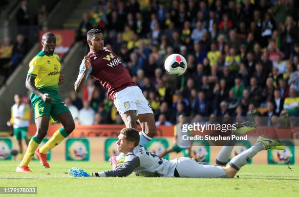Wesley of Aston Villa shoots as Michael McGovern of Norwich City attempts to save during the Premier League match between Norwich City and Aston...