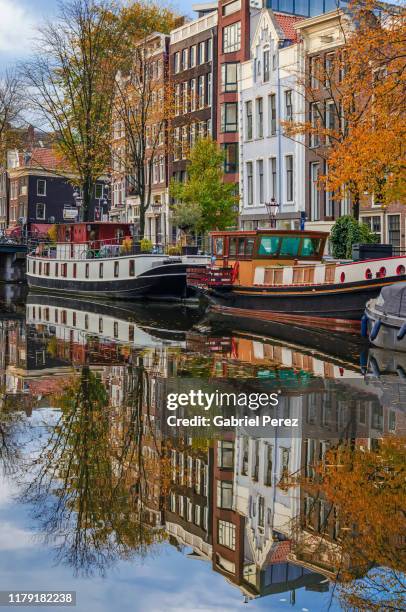 an amsterdam canal landscape - amsterdam autumn stock pictures, royalty-free photos & images