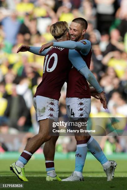 Jack Grealish of Aston Villa celebrates with Conor Hourihane of Aston Villa after Conor Hourihane scores his sides fourth goal during the Premier...