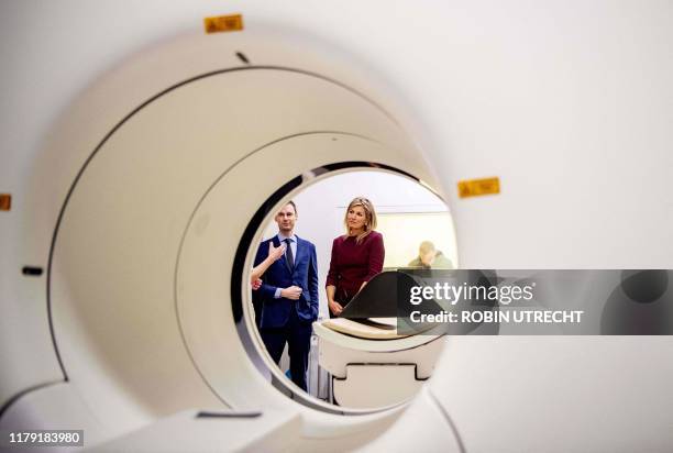 Dutch Queen Maxima takes part in a guided tour of the Translational Brain Laboratory in the Amsterdam UMC in Amsterdam, on October 31, 2019. /...