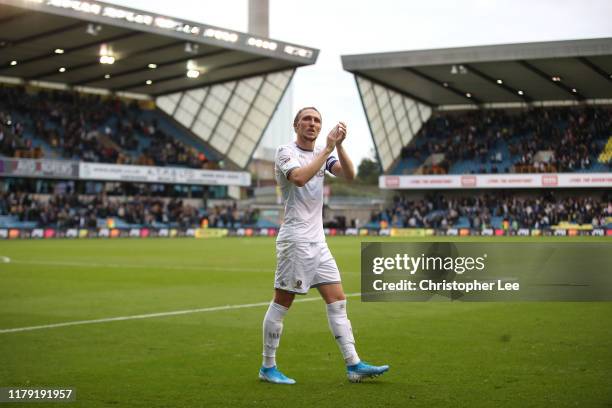 Luke Ayling of Leeds applauds the travelling fans after the match during the Sky Bet Championship match between Millwall and Leeds United at The Den...