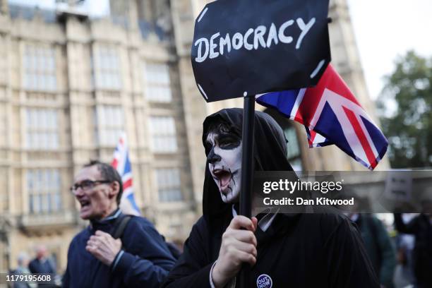 Pro-Brexit activists march outside the Houses of Parliament on what would have been the day that the United Kingdom left the European Union, on...