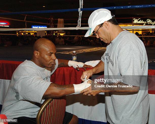 Mike Tyson and World Champion Trainer Jeff Fenech during Iron Mike Tyson Starts Training Camp at Aladdin/Planet Hollywood Resort and Casino at...