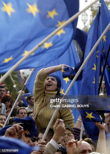 Maltese supporters of the "Yes" to the entrance of Malta in the European Community celebrate their victory following the referendum vote, 09 March...