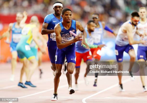 Wilbert London and Nathan Strother of the United States compete in the Men's 4x400 metres relay heats during day nine of 17th IAAF World Athletics...