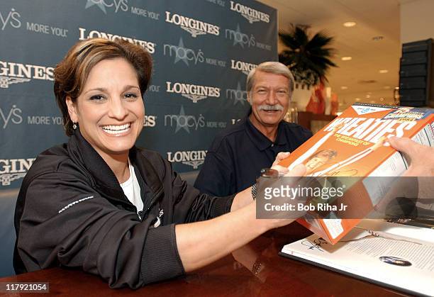 Olympian Mary Lou Retton , an official with the "Longines Perfect 10 Moments in Time" joined famed Olympic coach Bela Karolyi signing autographs for...