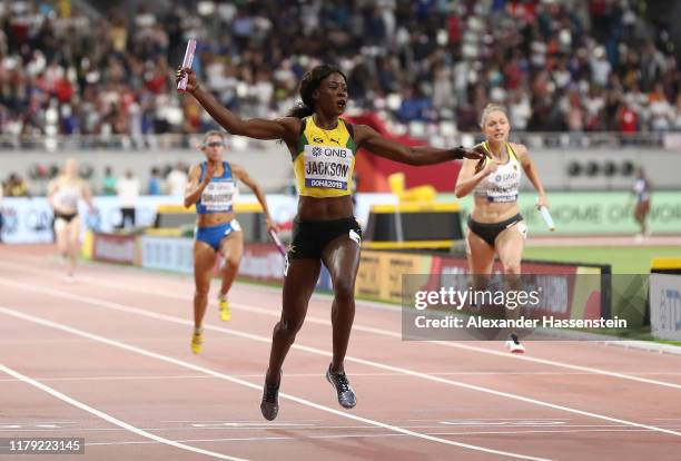 Shericka Jackson of Jamaica, gold, crosses the finish line in the Women's 4x100 Metres Relay during day nine of 17th IAAF World Athletics...