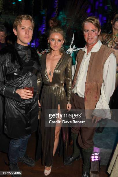 Archie Rutland, Camilla Blandford and George Spencer-Churchill attend Annabel's Halloween Party on October 31, 2019 in London, England.