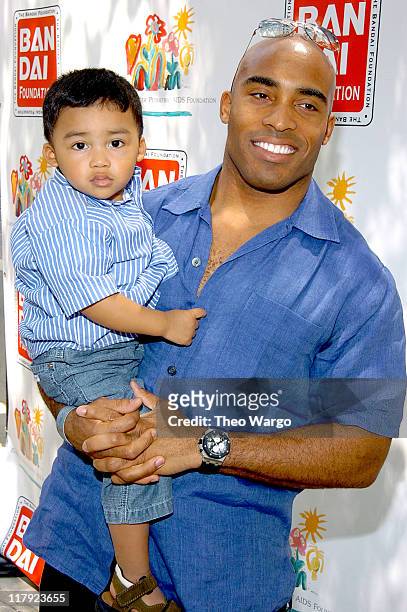 Tiki Barber and son during 11th Annual Kids for Kids Celebrity Carnival to Benefit the Elizabeth Glaser Pediatric AIDS Foundation - Arrivals at...