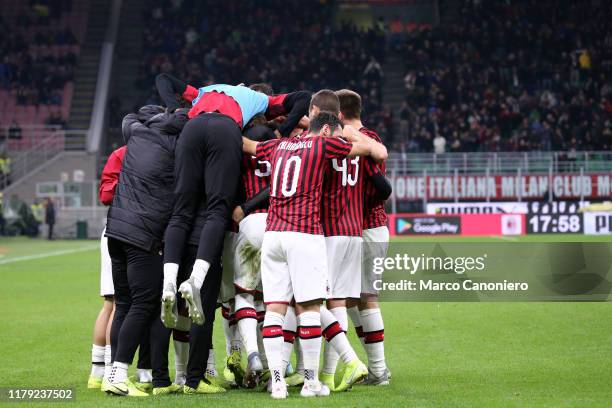 Players of Ac Milan celebrate after scoring a goal during the the Serie A match between Ac Milan and Spal. Ac Milan wins 1-0 over Spal.