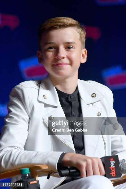 Maxwell Jenkins onstage during the Netflix Presents: Lost in Space panel at New York Comic Con 2019 Day 3 at Jacob K. Javits Convention Center on...