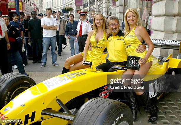 Eddie Jordan with pit babes Leah Newman, on his left, and Michelle Clack at the launch for the Regent Street Formula One Parade