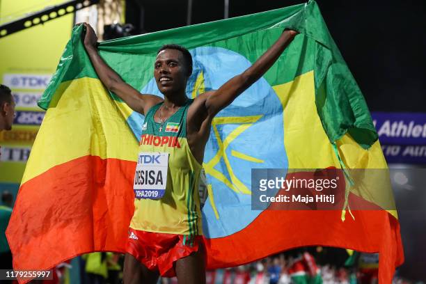 Lelisa Desisa of Ethiopia celebrates after winning the Men's Marathon during day nine of 17th IAAF World Athletics Championships Doha 2019 at Khalifa...