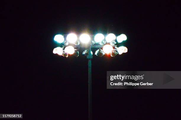 stadium floodlights - stadium lights stock-fotos und bilder