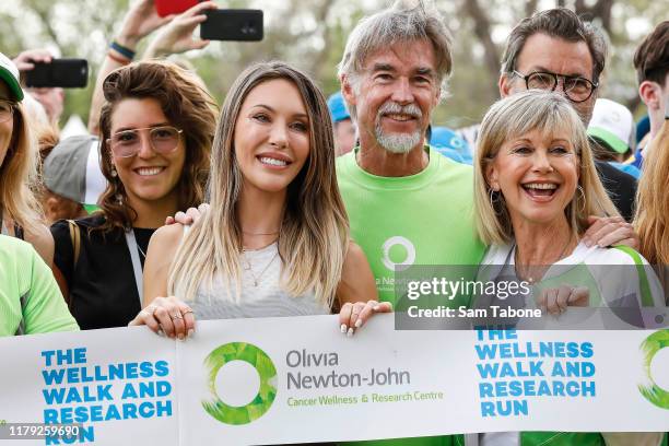 Chloe Lattanzi, John Easterling and attends the Olivia Newton-John Wellness Walk and Research Run on October 06, 2019 in Melbourne, Australia. The...