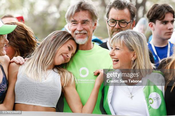 Chloe Lattanzi, John Easterling and attends the Olivia Newton-John Wellness Walk and Research Run on October 06, 2019 in Melbourne, Australia. The...