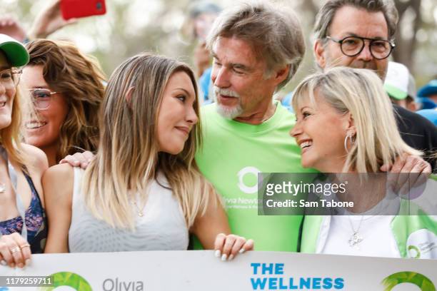 Chloe Lattanzi, John Easterling and attends the Olivia Newton-John Wellness Walk and Research Run on October 06, 2019 in Melbourne, Australia. The...