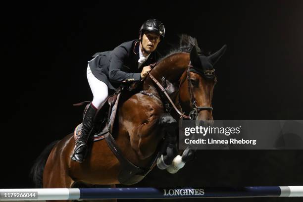 Sergio Alvarez Moya of Spain rides Jet Run in the Challenge Cup during Day 3 of Longines FEI Jumping Nations Cup Final at Real Club de Polo de...