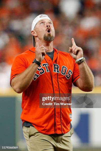 Billy Wagner reacts after throwing out the first pitch to Roberto Osuna of the Houston Astros before Game 2 of the ALDS at Minute Maid Park on...