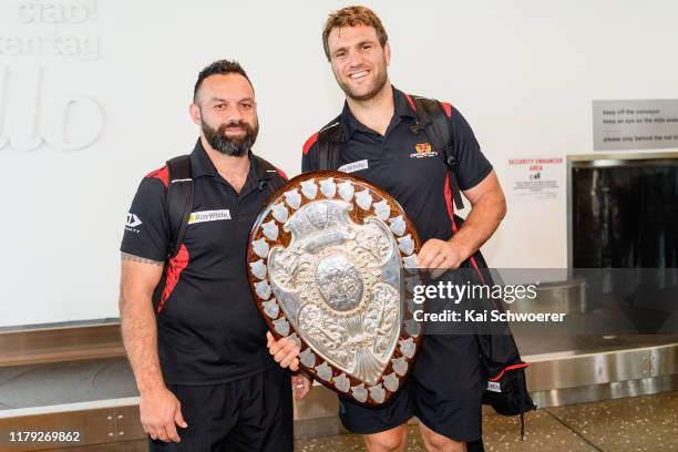 Head Coach Joe Maddock and captain Luke Whitelock of Canterbury pose with the Ranfurly Shield at Christchurch Airport on October 06, 2019 in...