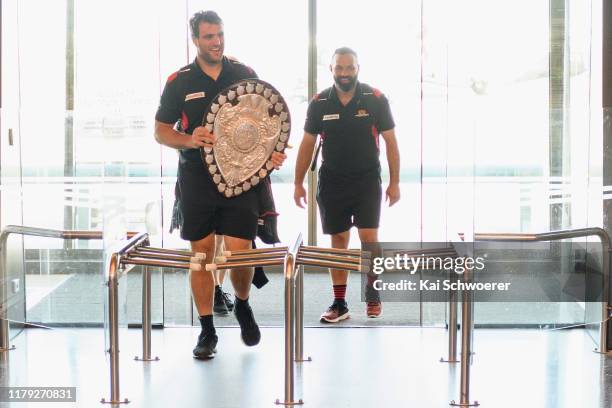 Captain Luke Whitelock and Head Coach Joe Maddock of Canterbury arrive home with the Ranfurly Shield at Christchurch Airport on October 06, 2019 in...