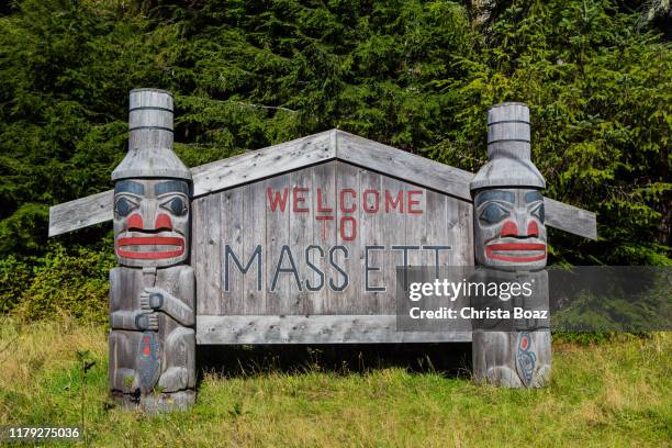 welcome to masset - haida gwaii totem poles stock pictures, royalty-free photos & images
