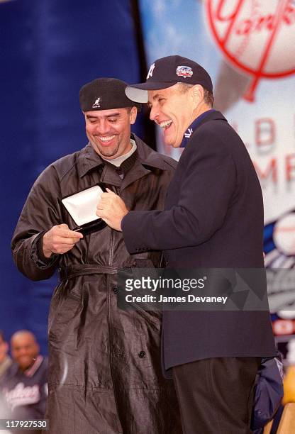 Luis Sojo and Mayor Rudolph Giuliani during Ticker Tape Parade for the New York Yankees, 2000 World Series Champions at City Hall in New York, NY,...